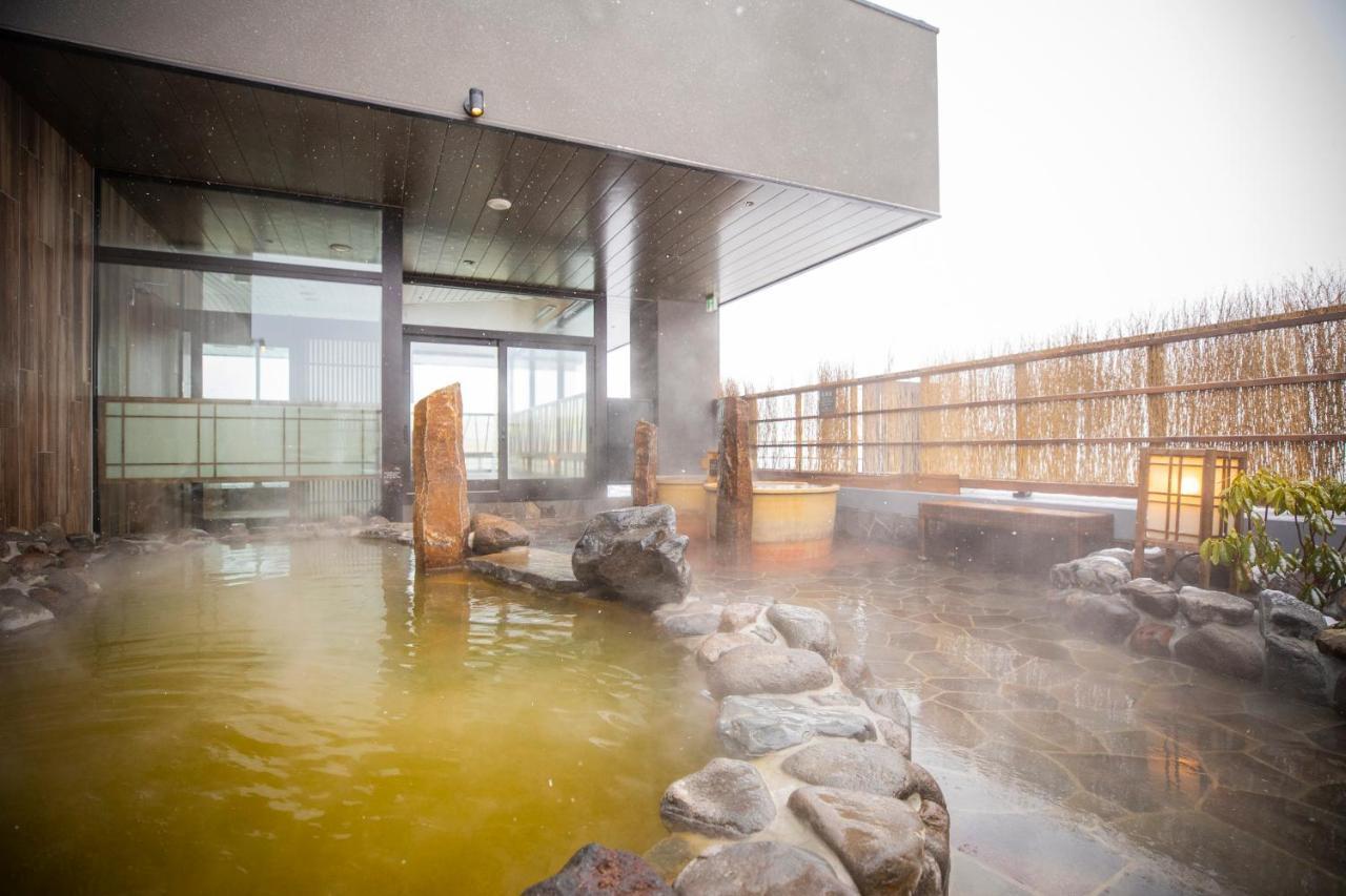 La Vista Furano Hills Natural Hot Spring Bagian luar foto